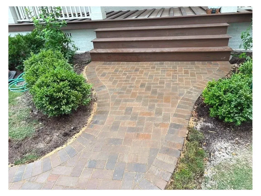 Paver walkway and planting beds installed by Panther Landscape in northern Illinois and southern Wisconsin